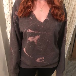 Cut out sweatshirt with bleach design